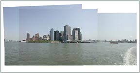 view of Jersey City, lower Manhatan and Brooklyn, June 2002.