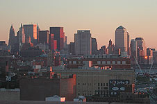 sunset on the Financial District of New York showing the scars after 911