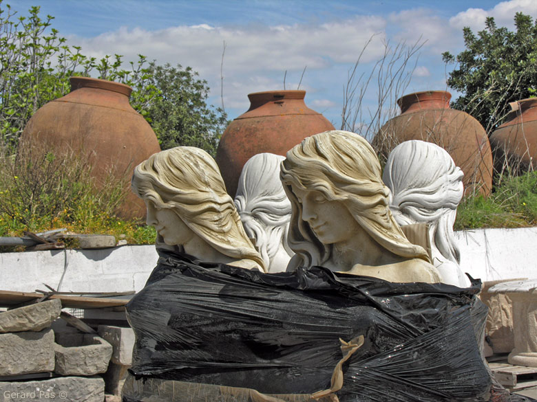 Statuary and urns in Porches, Algarve, Portugal - click to enlarge image