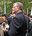 City Controller Gord Hume stands by and watches the Memorial dedication.